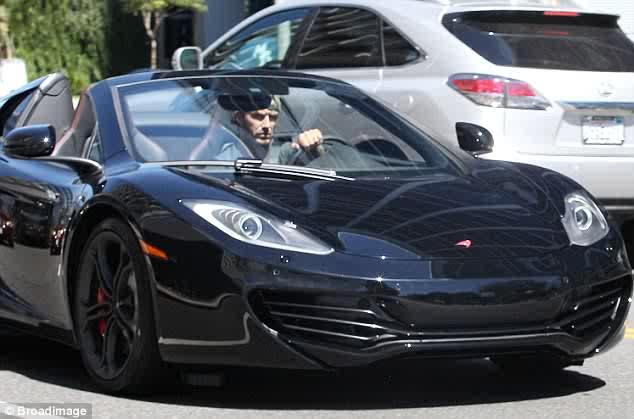 David Beckham in his McLaren MP4-12C Spider