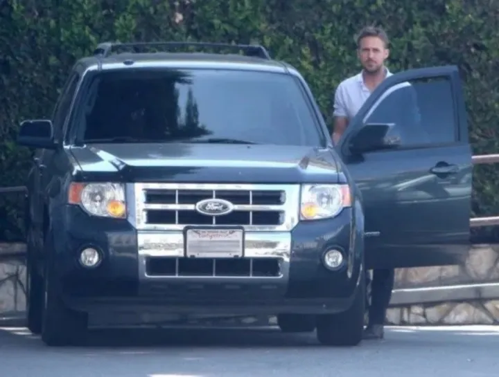 Ryan Gosling in his Ford Escape Hybrid